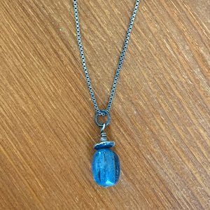 Blue stone pendant with silver box chain